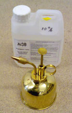 Miniature brass plant sprayer for use in injecting woodworm holes in furniture using Boron Ultra 12 at 5% in water.